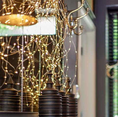 entry way styling with lights and pots