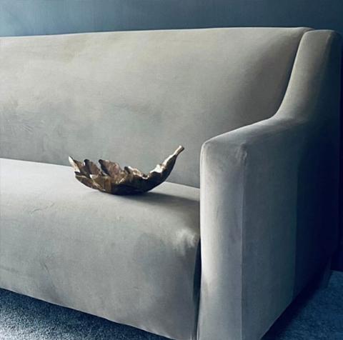 Sofa with leaf on chair