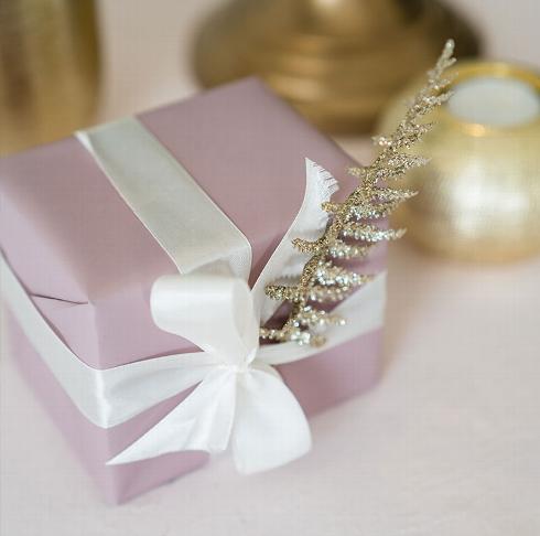 Luxury wrapped package on table